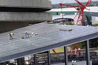 Construction crew working on Southeast Terrace roof