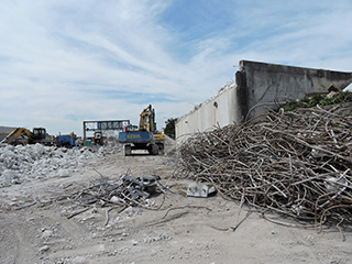 Concrete and rebar left over from Taxiway J demo