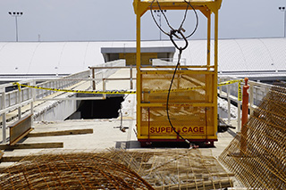 Construction crews start to remove guideway to make way for APM station