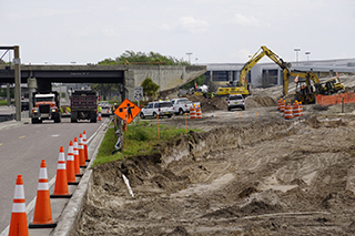 Taxiway J demo and temporary service road