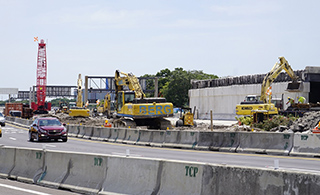 Middle span of Taxiway J bridge demolished