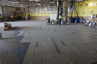 Tile being set for P.F. Chang's space