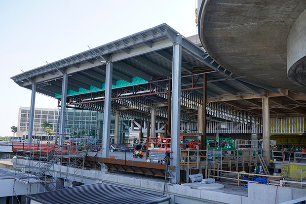 West side terrace glass being installed