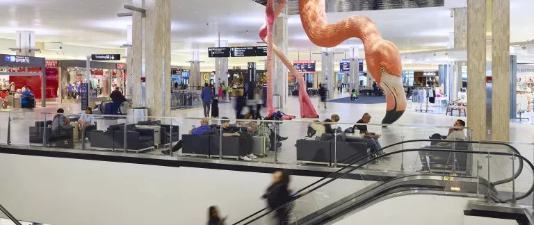 Tampa International Airport Main Terminal with large flamingo sculpture in background
