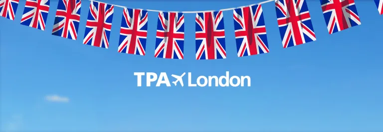 a string of union jack flags - TPA to London
