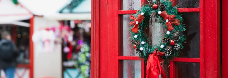 Christmas decoration on london phone booth