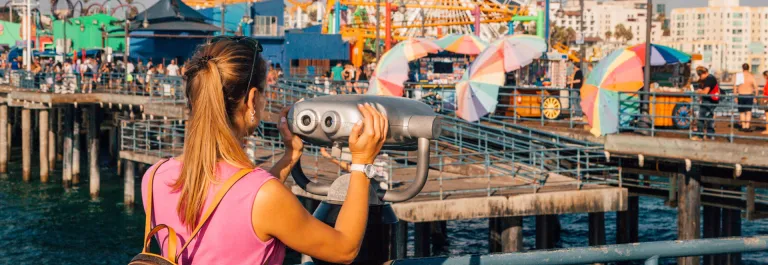 Woman looking onto santa monica pier