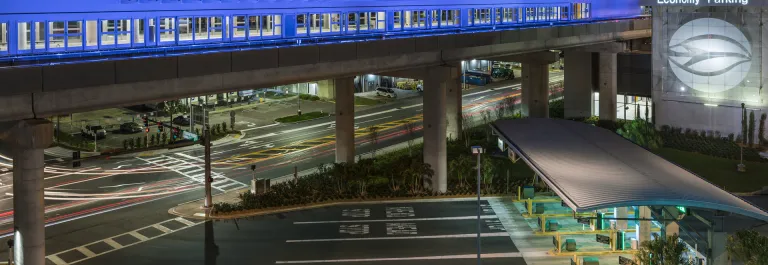 Economy parking garage lit up at night