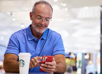 Man on mobile phone browsing