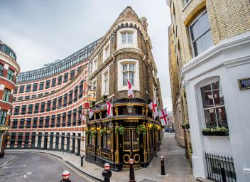 Pub entrance in London on narrow street