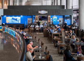 people seated at Rum Fish Grill restaurant at Tampa International Airport