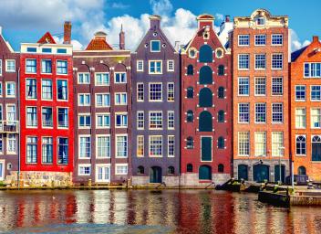 houses along canal in amsterdam