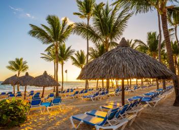 Beach in Punta Cana with beach chairs and umbrellas