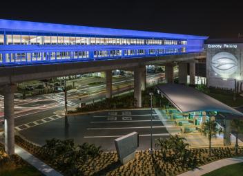 Economy parking garage lit up at night