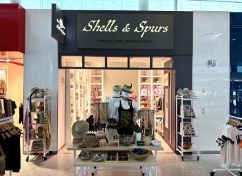 Shells and Spurs storefront at TPA