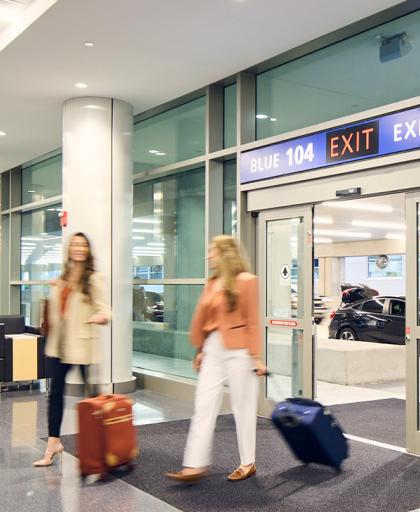 Passengers arriving at express curb