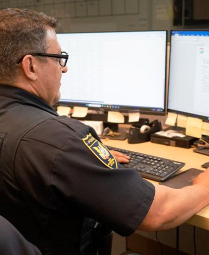 Officer at work station