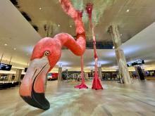"Home" the 31-foot flamingo art piece inside the Main Terminal